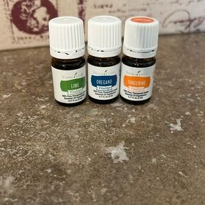 YoungLiving essential oils. Lime, tangerine, and oregano. 5ml each. + FREE GIFT!